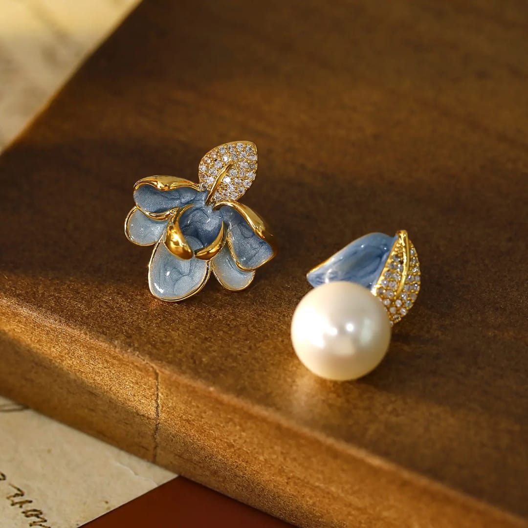 Aylin Blue Floral Asymmetrical Earrings – Gold Plated  Mismatched Pearl Drop Earrings for Women ₹110.00